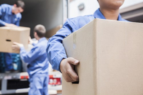 Removal van and moving boxes for a New Cross home move