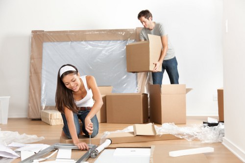 Removal van and moving boxes for a New Cross house move