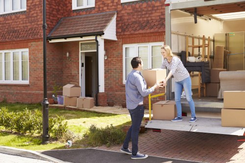 Man with van removal service helping with a local move in New Cross
