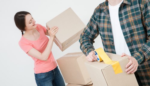 Careful transport of household items during a New Cross removal