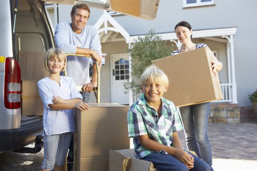 Household boxes and furniture prepared for removals in New Cross