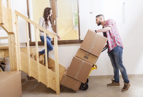 Packing and loading household items for a New Cross move
